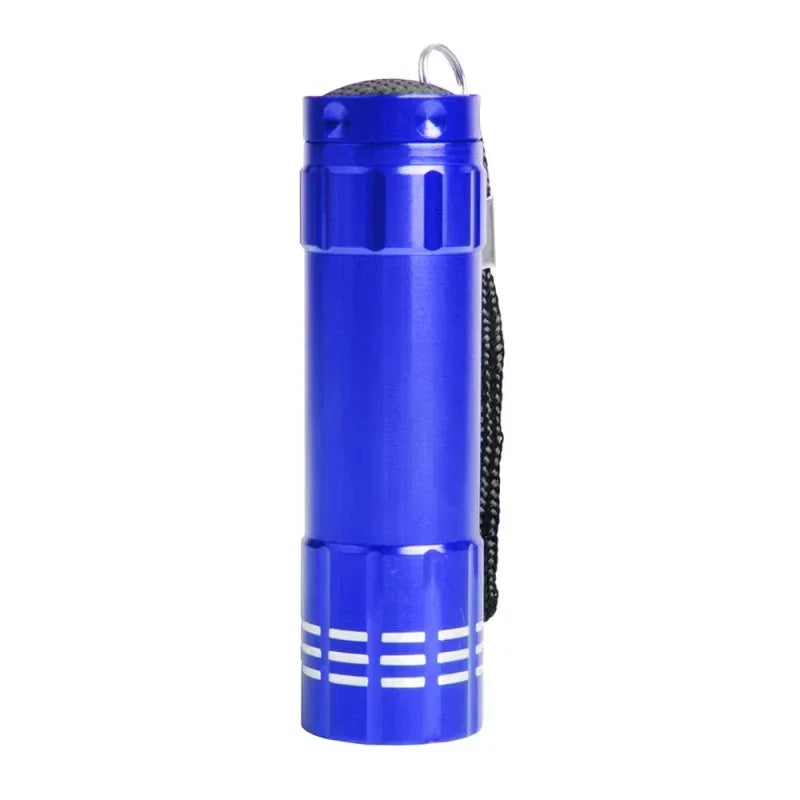A blue rechargeable UV blacklight flashlight with a textured grip and a light-colored base.