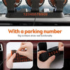 A close-up of a car cooling fan with a parking number display showing digits and an aromatherapy diffuser.