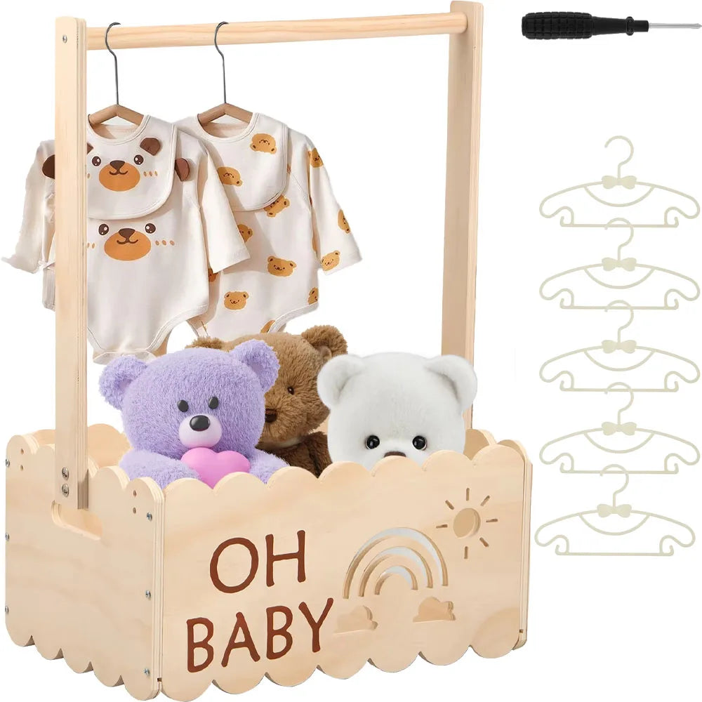 Rustic wooden baby shower crate with a wooden frame holding three bear-themed baby shirts and a hanger