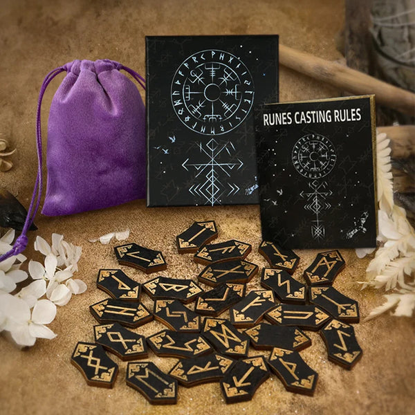 A set of wooden rune stones, a guide book, and a purple velvet bag for divination.