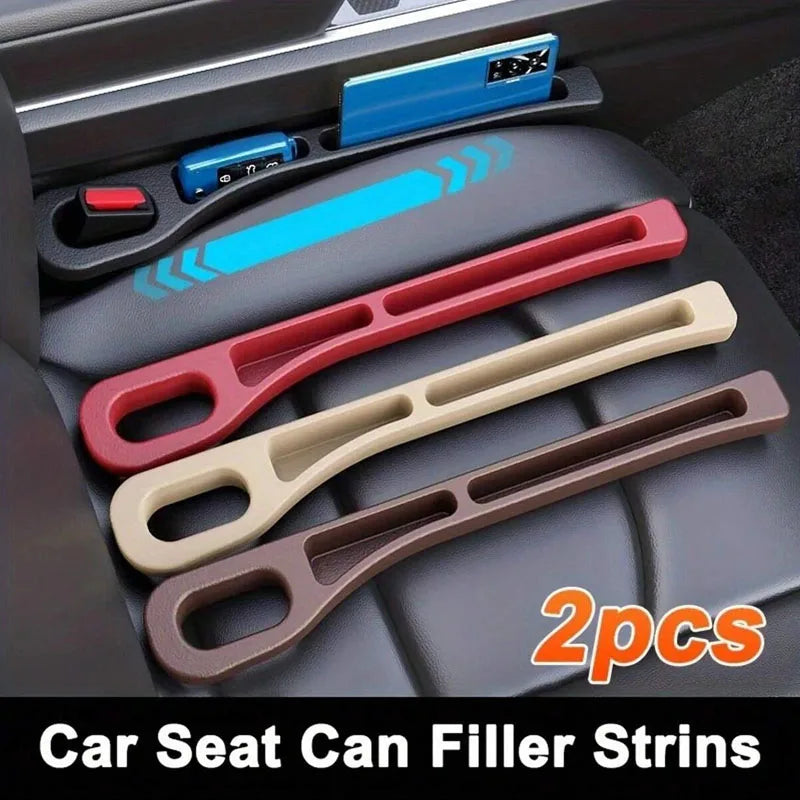A pair of car seat gap filler strings with various colored plastic grooves shown in a car interior setting.