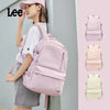 A young woman is shown carrying a pink ultralight water-resistant laptop backpack in various shades and styles.