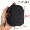 Black Oxford 2 utility pouch shown being held, measuring 10cm high and 8cm wide.