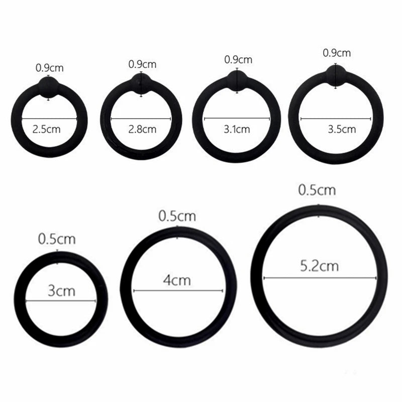 A collection of silicone cock rings in various sizes and shapes, including ovals and circles.