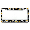 Black and white daisy patterned aluminum license plate frame for a car tag holder
