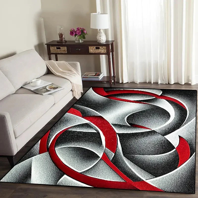 Abstract geometric anti-slip area rug featuring swirling red and gray patterns on a dark floor.