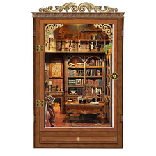 A wooden cabinet with glass doors displaying an illuminated miniature book nook kit featuring shelves, books, and decorative 