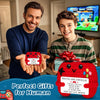 A boy holds a red crochet game controller decoration in front of a television screen.