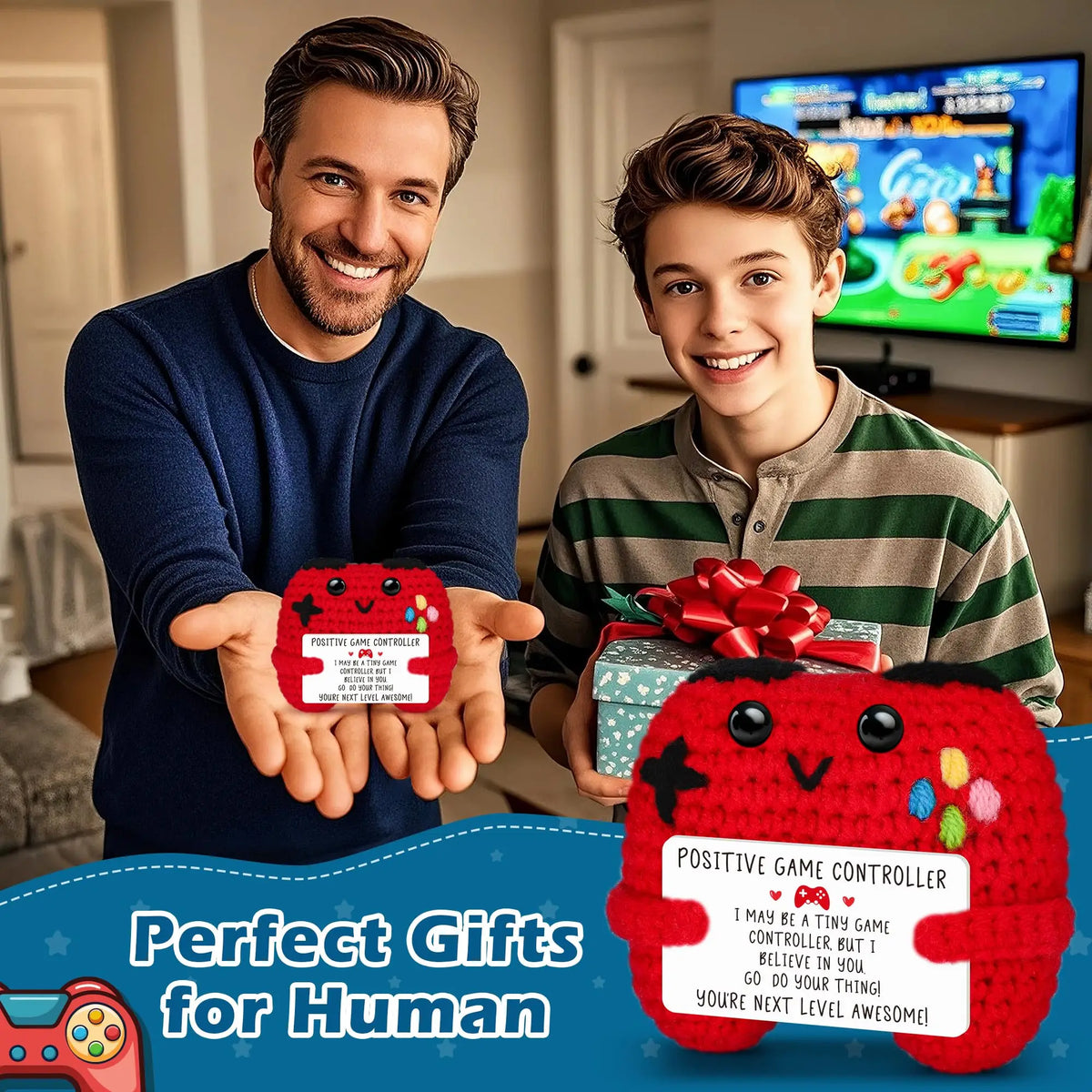 A boy holds a red crochet game controller decoration in front of a television screen.