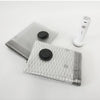 A clear reusable vacuum compression bag with a black seal and a white hand pump for travel and storage.
