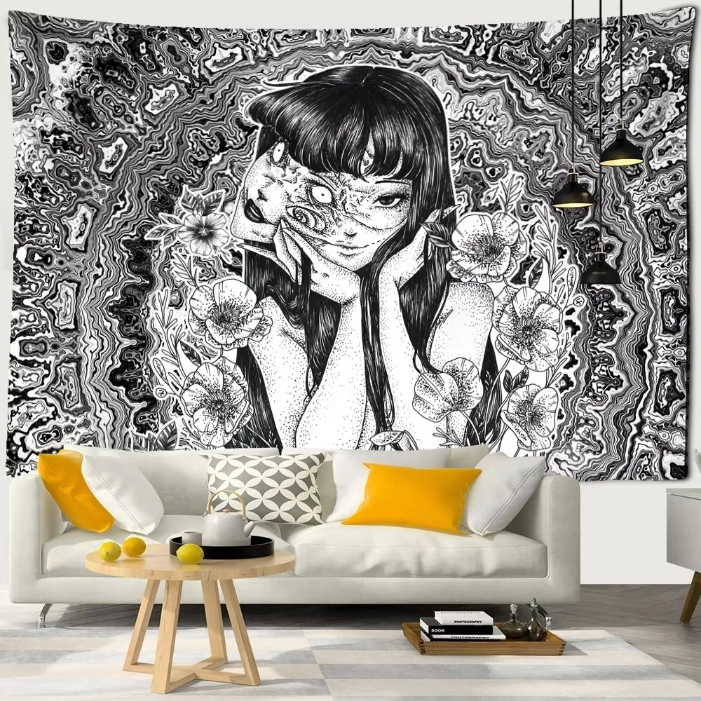 A black and white tapestry featuring a stylized portrait of a woman with dark hair and intricate, swirling patterns.