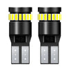 A pair of black LED bulbs with yellow accents and a connector, used for replacement.