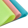 Rolls of colorful waterproof refrigerator liner mats in lime green, peach, and turquoise.