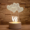 A white LED night light lamp featuring three heart-shaped light projections above the letters LOVE