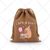 A brown drawstring storage bag featuring a cute capybara illustration for a birthday gift.