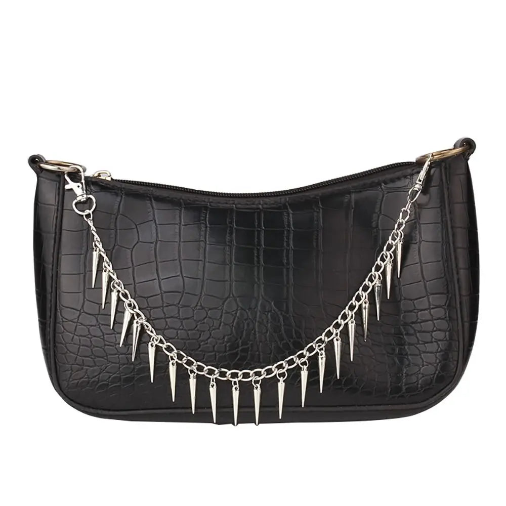 Black crocodile embossed leather handbag with a silver spike chain strap