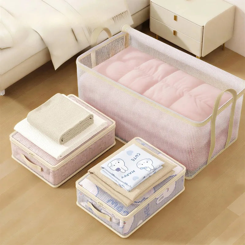 A set of clear mesh storage bags for clothes, blankets, and bedding, including a large pink storage box and smaller fabric st