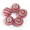 A set of five round resin rhinestone beads with a two-tone red and clear striped design.