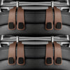 Car headrest hooks in brown leather securing bags and shopping organizers
