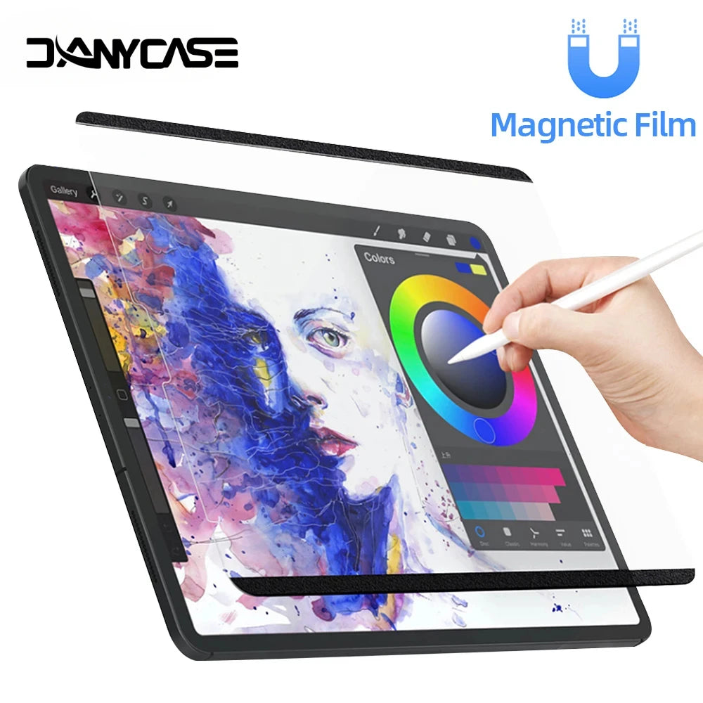 A hand writes on a tablet screen protected by a magnetic film, displaying colorful artwork.