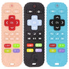 Three silicone teething remotes in peach, black, and light blue showing various buttons for babies