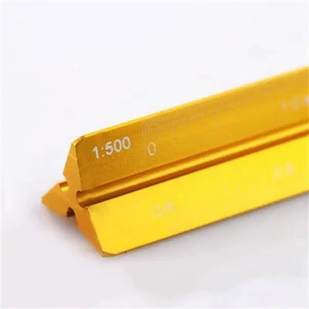 A golden aluminum triangular scale ruler with markings for drafting and drawing.
