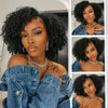 A woman models a dark curly wig with a drawstring on a denim shirt.