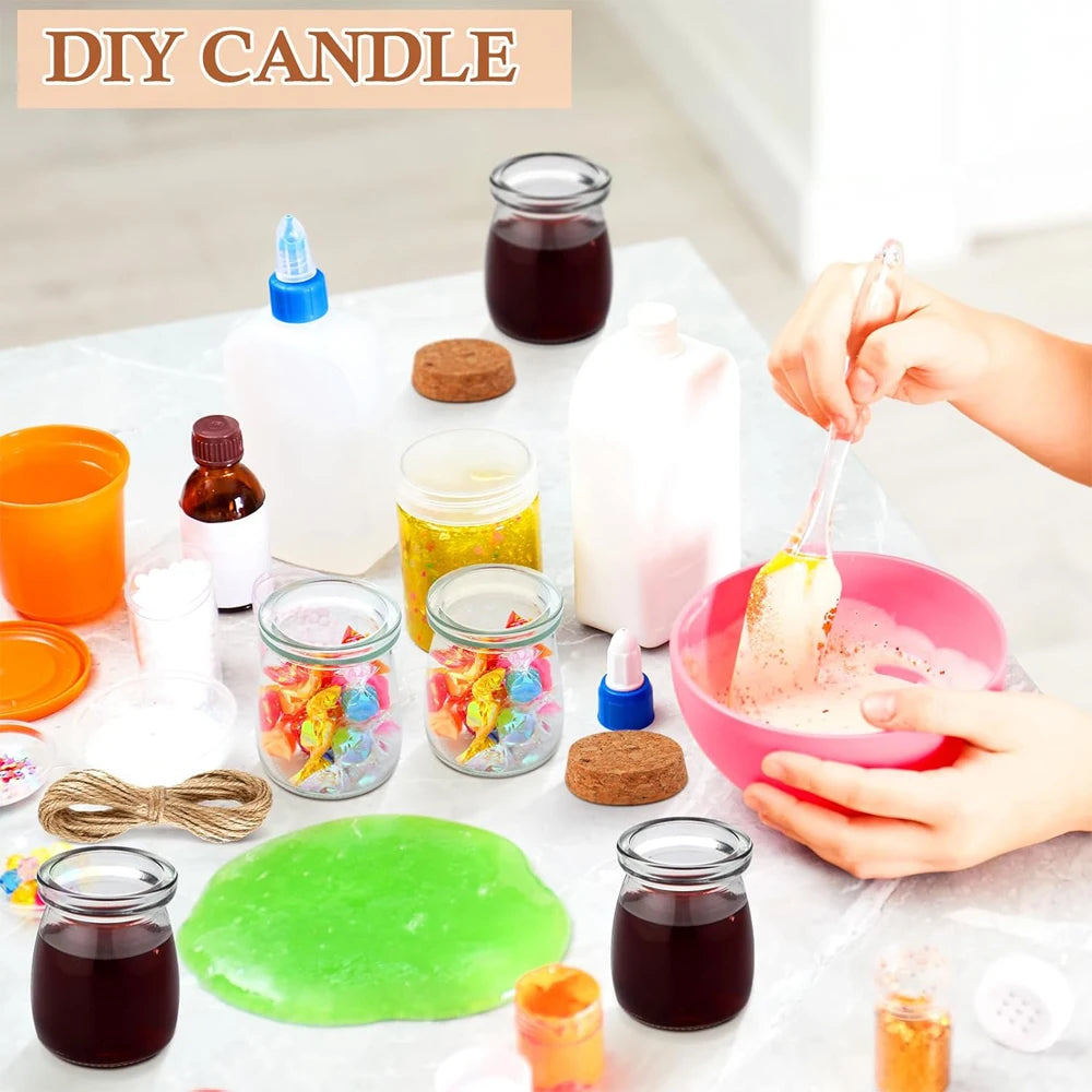 A collection of DIY candle ingredients including colored oils, wax, and decorative elements in glass jars.