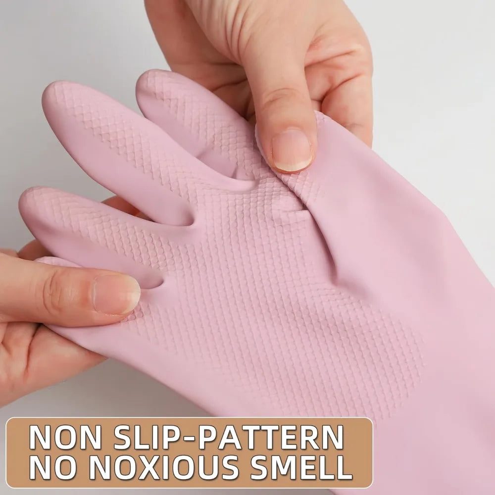 A hand is holding a pink reusable non-slip rubber dishwashing glove, showing the texture and fit.