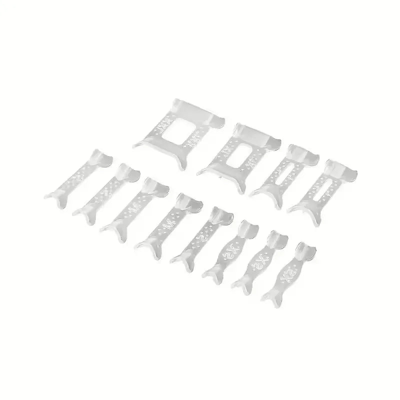 A pack of twelve clear invisible ring size adjuster pads for jewelry.