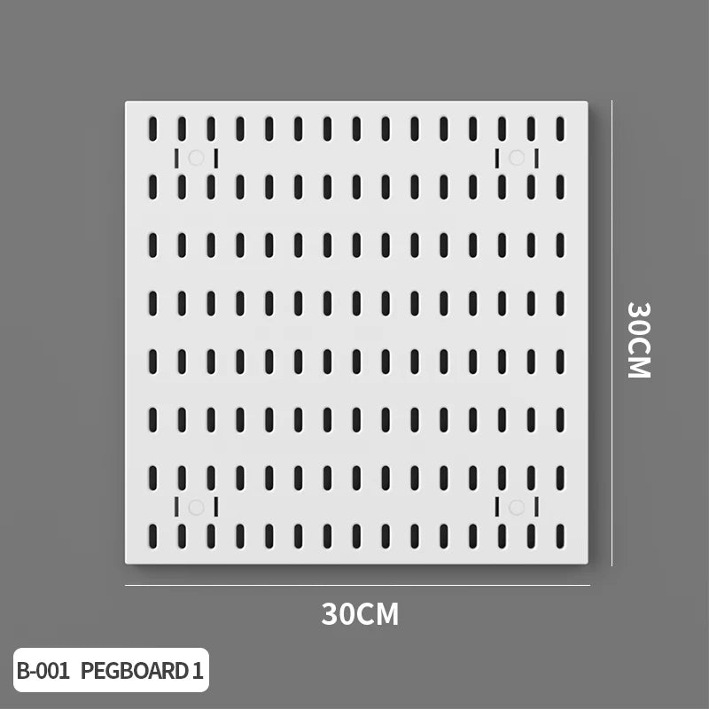 A white pegboard organizer board with numerous holes for hanging items and shelves, shown against a gray background.