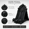A black gothic skull phone stand featuring intricate arch designs and a stable base.
