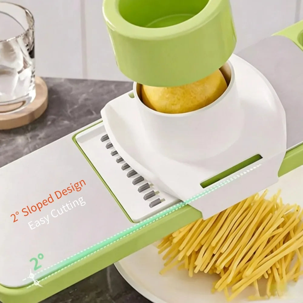 A white and lime green multifunctional stainless steel vegetable cutter with a yellow piece of fruit resting on it.