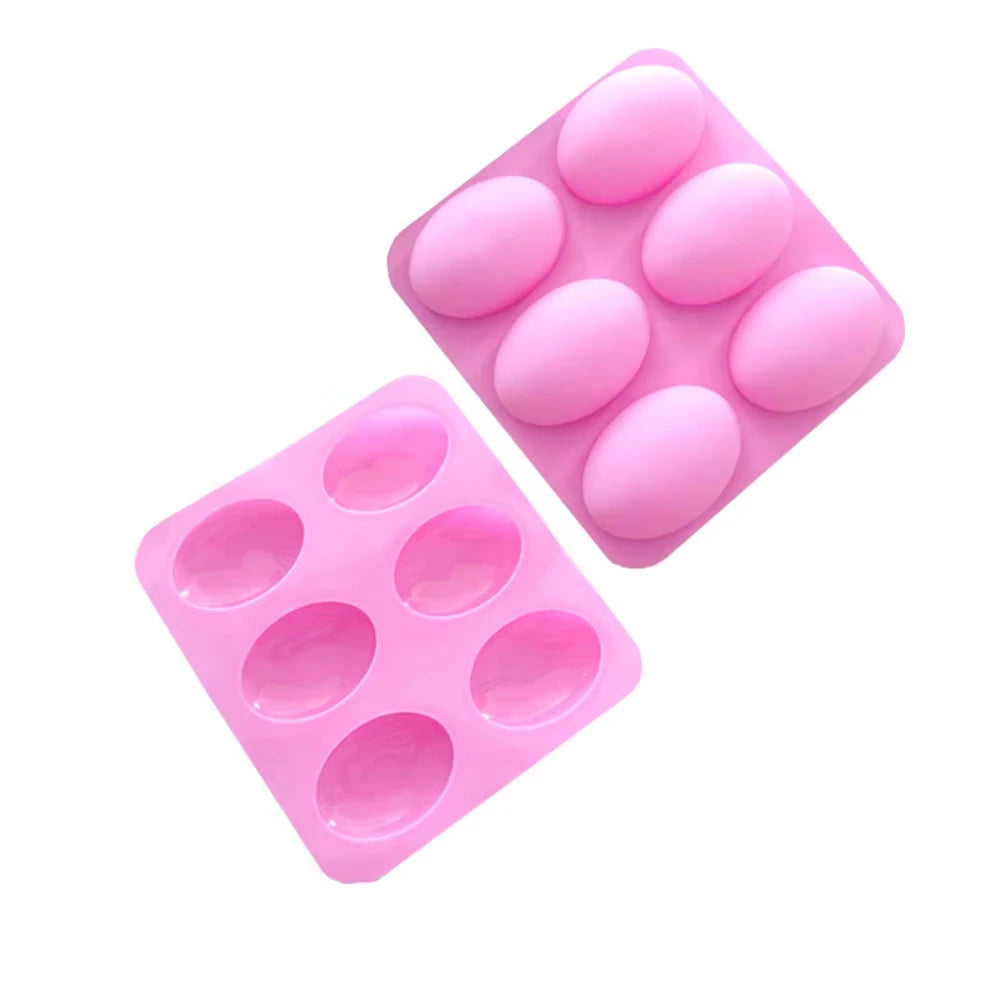 A pink silicone mold with six cavities for soap, baking, and DIY crafts.