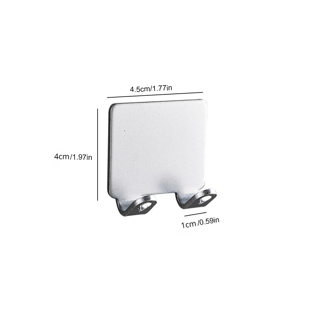 A white aluminum wall-mounted adhesive razor holder with dimensions 4.5cm by 4cm.