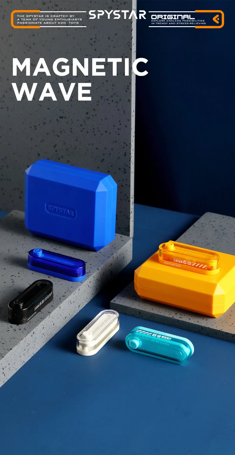 A collection of colorful metal fidget sliders and magnetic wave toys displayed on a blue surface.