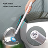 A hand is pushing a white wand from a wall-mount holder onto a toilet bowl for cleaning.