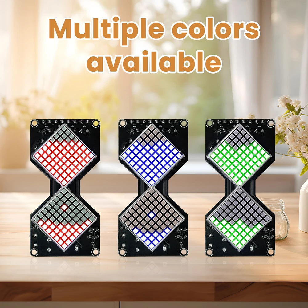 Three LED matrix digital hourglass kits in red, blue, and green colors displayed on a wooden surface.