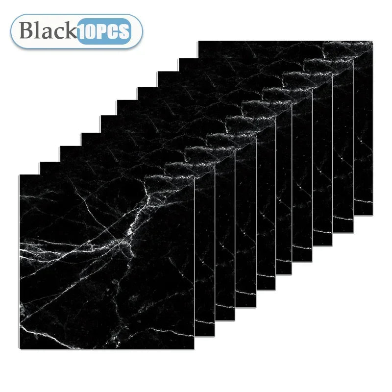 A close-up view of black marble-patterned self-adhesive waterproof tile stickers arranged in a grid.