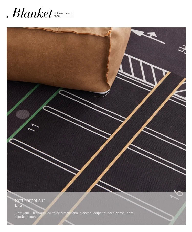 A close-up view of a brown velvet blanket placed on a dark play mat with white and gold lines.