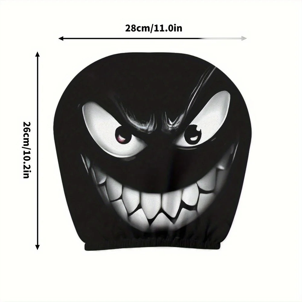 A black plush cover depicting a menacing, snarling monster face with large teeth and glowing eyes.