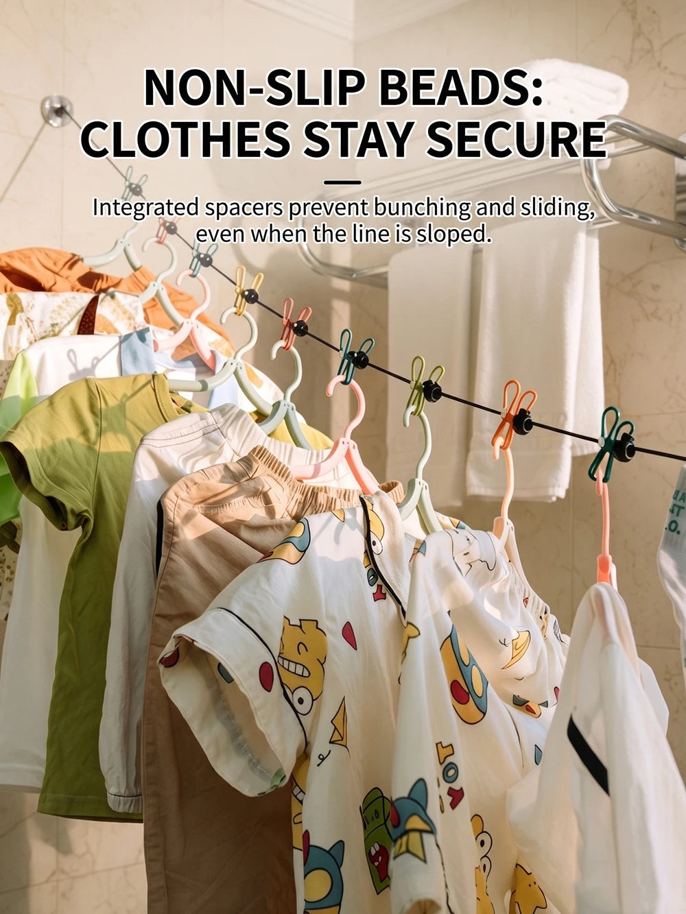 Clothes are hung on a non-slip bead line using integrated spacers to prevent bunching and sliding.