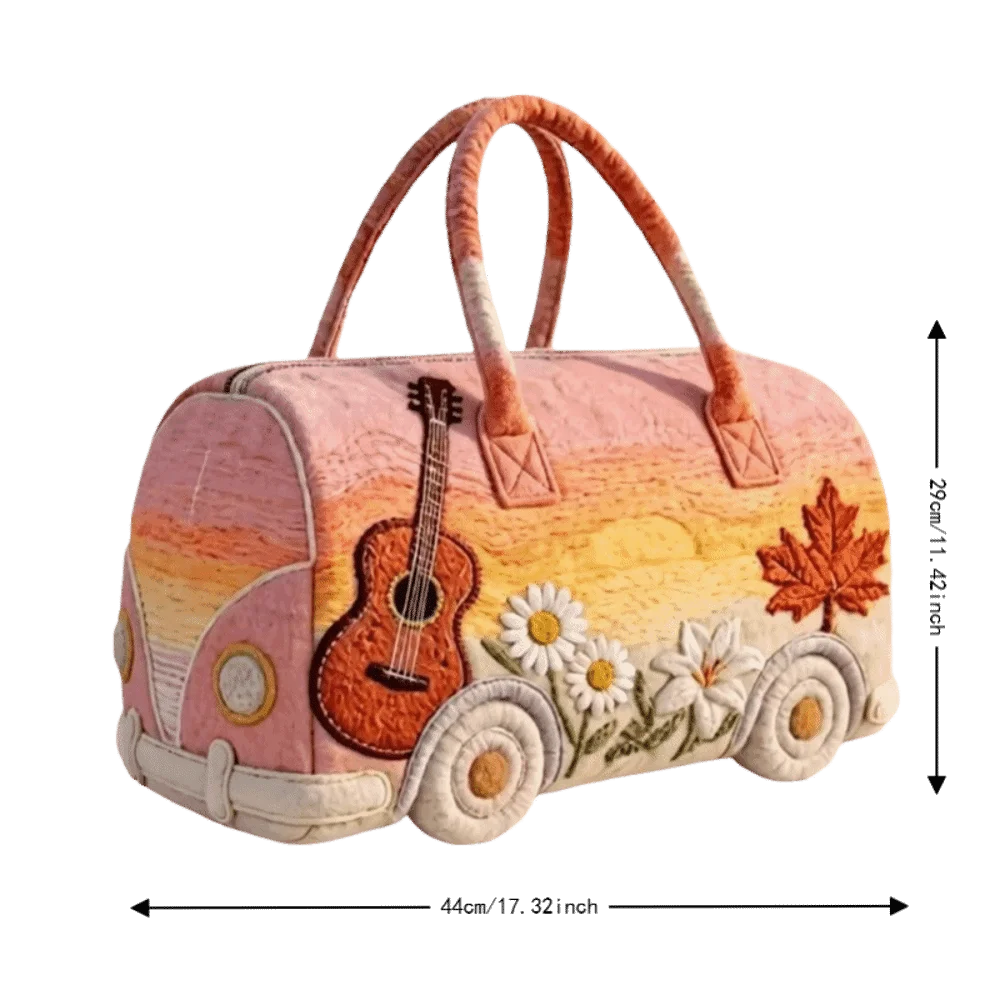 A pink quilted travel duffle bag featuring a guitar design and floral embroidery on its exterior.