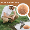A man is kneeling outdoors near a bird bath, with an orange disk labeled as a Bird Bath Purification Disk visible.