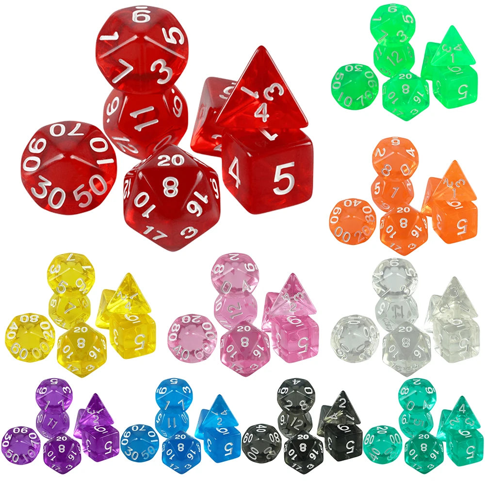 A set of seven transparent crystal polyhedral dice in various colors including red, green, orange, and clear.