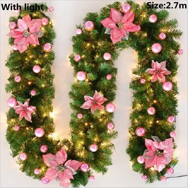 Green LED rattan Christmas garland with pink flowers and ornaments, measuring 2.7 meters.