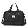 Black Zuomnni lightweight nylon travel duffle bag with padded handles