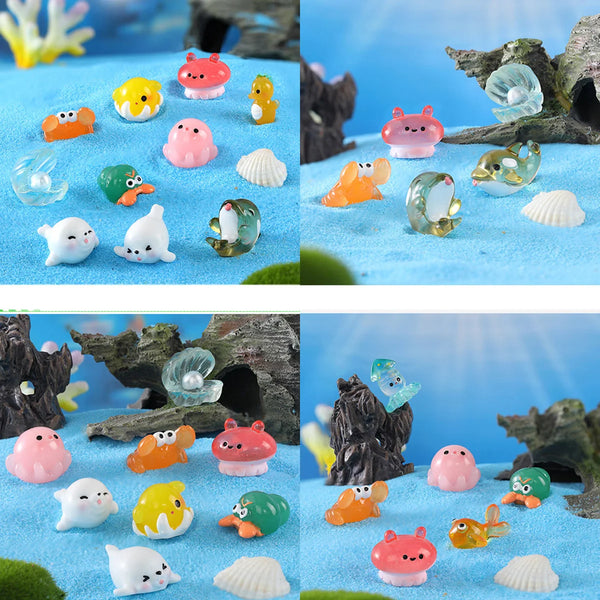A collection of colorful mini ocean resin animal figurines, including fish, sea creatures, and shells, displayed on blue text