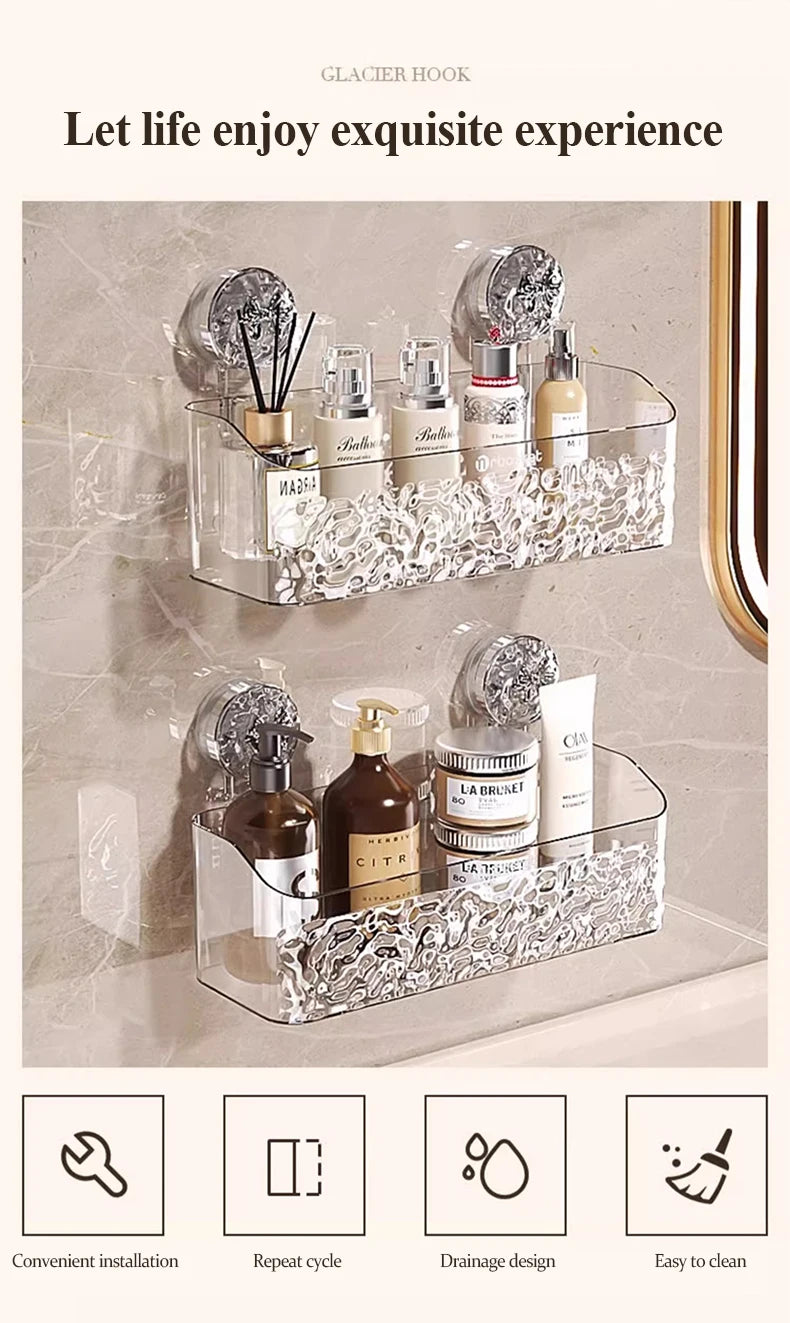 Clear wall-mounted suction cup storage basket with a water ripple design holding various bath products