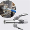 A silver heavy-duty grease gun coupler with a blue and silver barrel is shown alongside a metal tool.